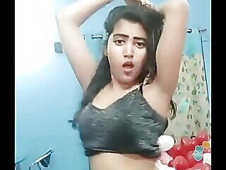 Indian teen Khushi puts on a seductive show, teasing and tempting with her sexual charms.